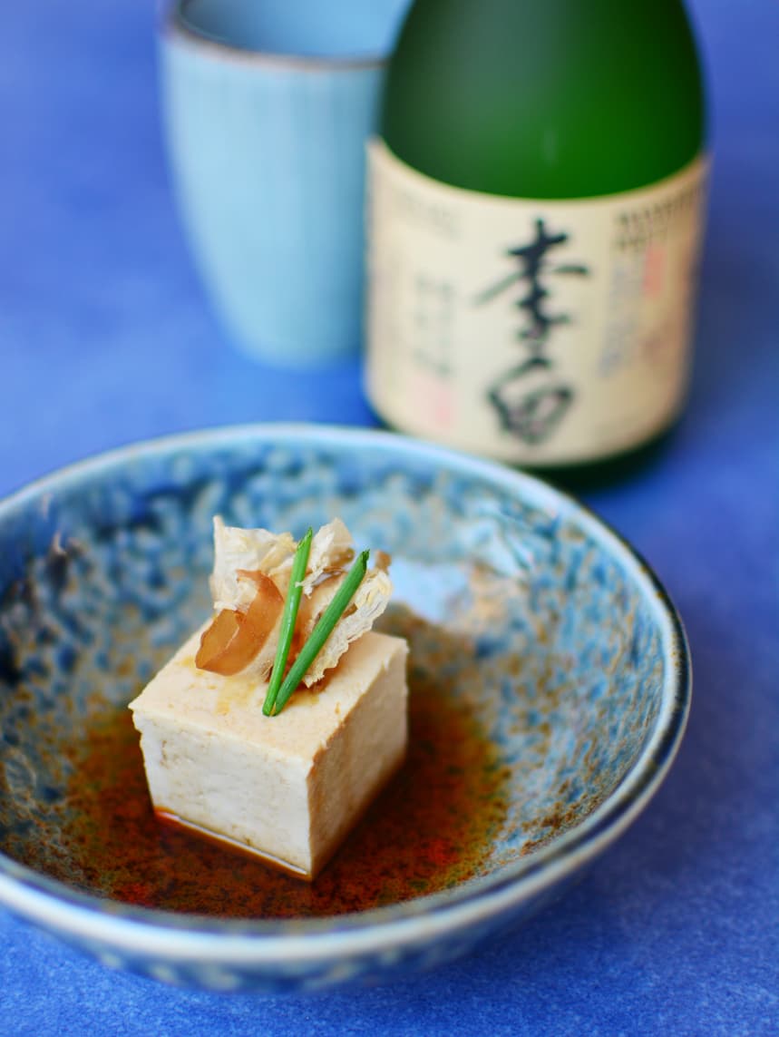 Tofu glazed in katsuo-shiso sauce presented on the plate
