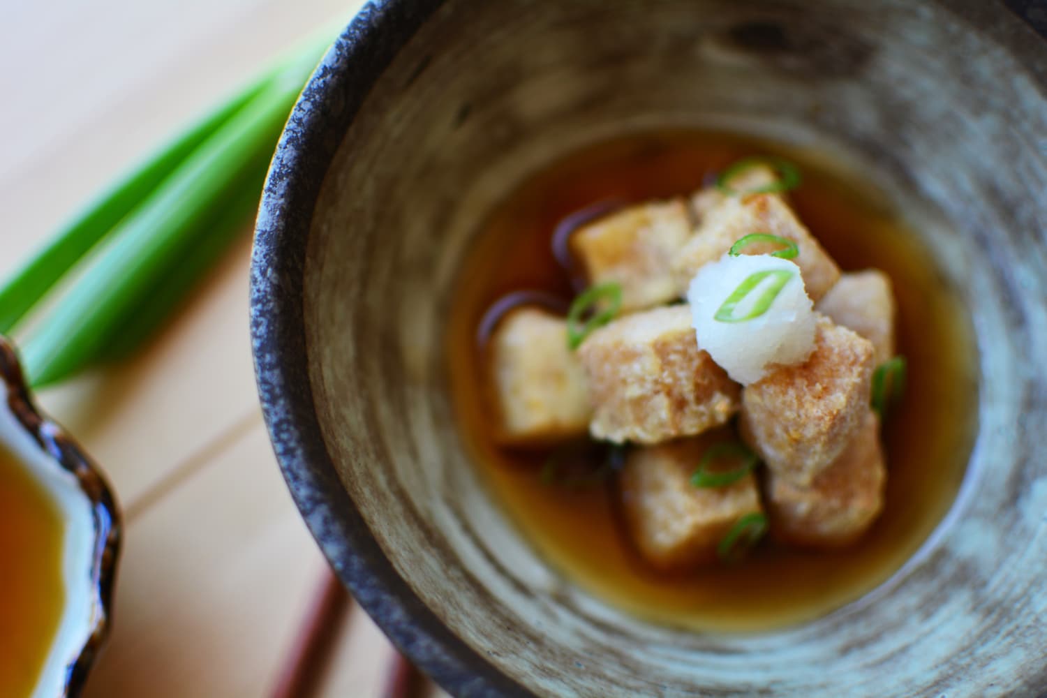 Tofu popcorn-deepfried tofu with vegetarian agedashi presented on the plate