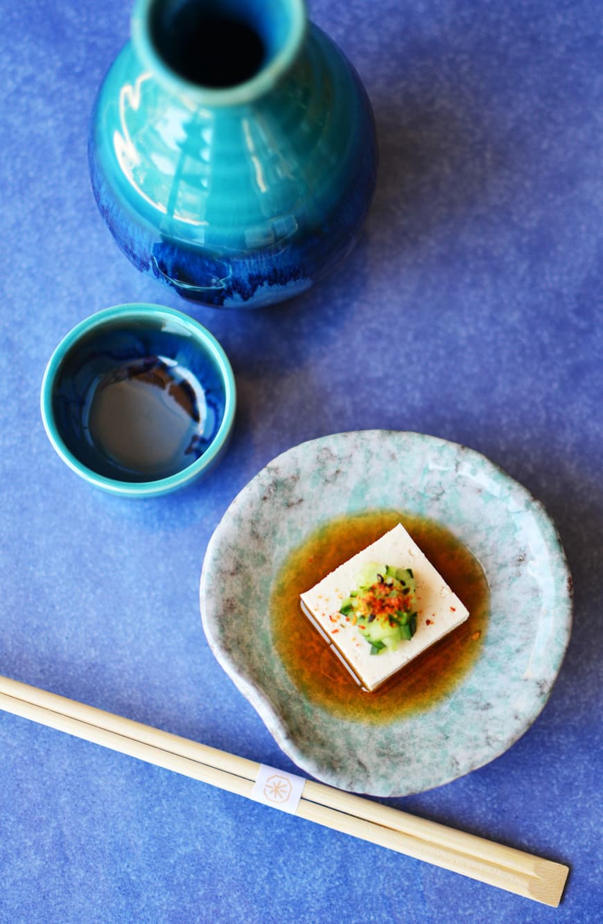 Tofu with cucumber-shichimi sauce presented on the plate